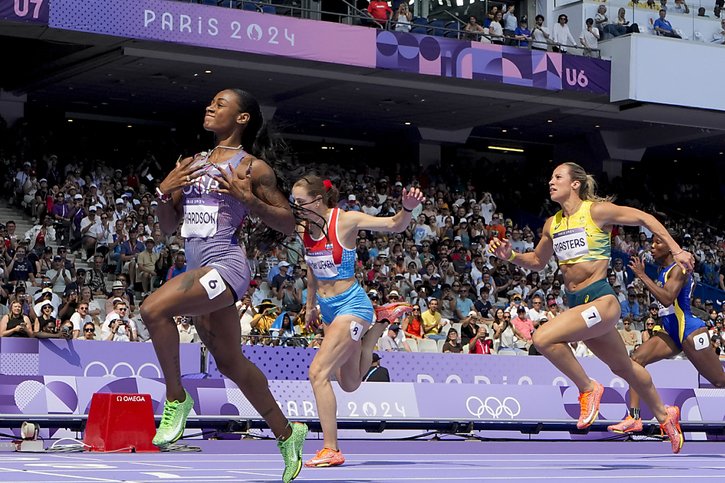 Sha'Carri Richardson (devant, en séries) sera favorite de la finale du 100 m, samedi à Paris. © KEYSTONE/AP/David J. Phillip